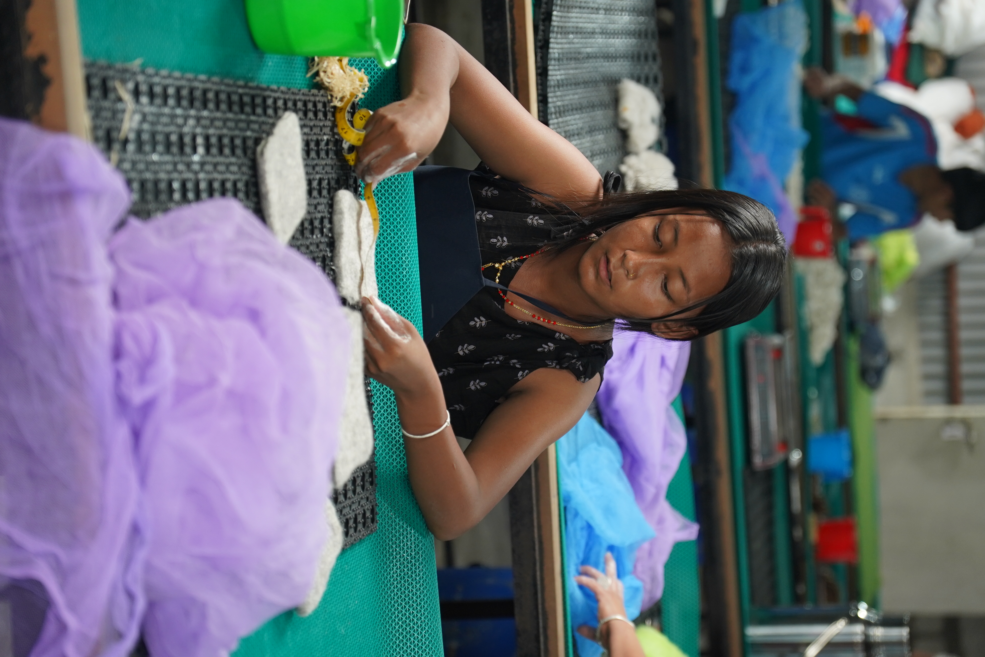 Artisan women working on handcrafted goods